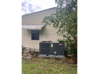 Welcome to Your Dream Home in Largo, Florida! Experience a blend on East Bay Golf Club in Florida - for sale on GolfHomes.com, golf home, golf lot