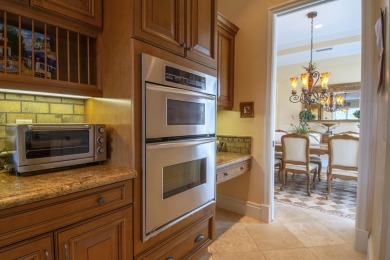 Primed for renovations, this custom-designed home awaits you on The Tesoro Golf Course and Club in Florida - for sale on GolfHomes.com, golf home, golf lot