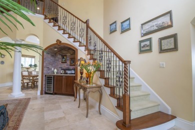 Primed for renovations, this custom-designed home awaits you on The Tesoro Golf Course and Club in Florida - for sale on GolfHomes.com, golf home, golf lot