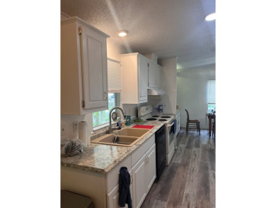 Welcome to Your Dream Home in Largo, Florida! Experience a blend on East Bay Golf Club in Florida - for sale on GolfHomes.com, golf home, golf lot