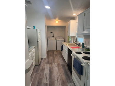 Welcome to Your Dream Home in Largo, Florida! Experience a blend on East Bay Golf Club in Florida - for sale on GolfHomes.com, golf home, golf lot