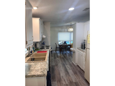 Welcome to Your Dream Home in Largo, Florida! Experience a blend on East Bay Golf Club in Florida - for sale on GolfHomes.com, golf home, golf lot