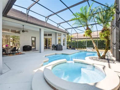 Luxurious, comfortable living awaits in this stunning home in on The Legacy Club At Alaqua Lakes in Florida - for sale on GolfHomes.com, golf home, golf lot