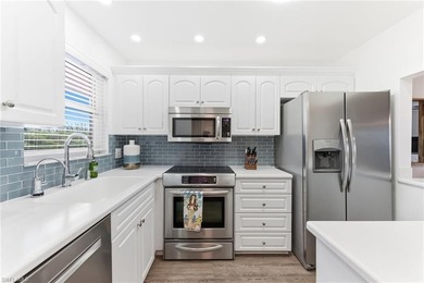 You can live in this bright sunlit quiet end unit situated in on Quail Run Golf Club In Naples in Florida - for sale on GolfHomes.com, golf home, golf lot