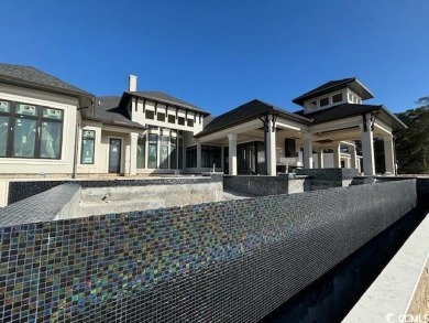 Amazing single story plan being built directly on the waterway on Barefoot Resort and Golf Club - Fazio Course in South Carolina - for sale on GolfHomes.com, golf home, golf lot