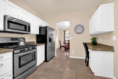 Live the lake community lifestyle in this spacious 4-bed home on on Estrella Mountain Ranch Golf Course in Arizona - for sale on GolfHomes.com, golf home, golf lot
