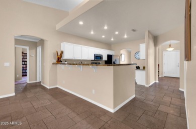 Live the lake community lifestyle in this spacious 4-bed home on on Estrella Mountain Ranch Golf Course in Arizona - for sale on GolfHomes.com, golf home, golf lot