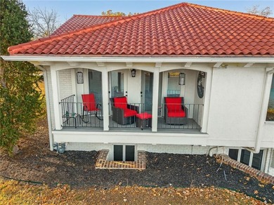 Experience the WOW factor of this beautiful lakefront property on Lakewood Oaks Golf Club, Ltd. in Missouri - for sale on GolfHomes.com, golf home, golf lot