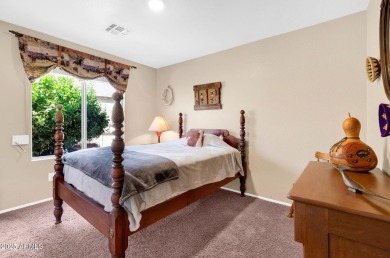 Live the lake community lifestyle in this spacious 4-bed home on on Estrella Mountain Ranch Golf Course in Arizona - for sale on GolfHomes.com, golf home, golf lot