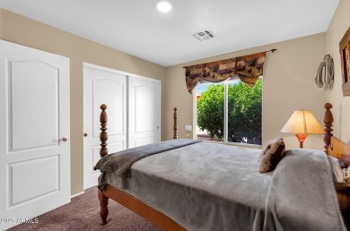 Live the lake community lifestyle in this spacious 4-bed home on on Estrella Mountain Ranch Golf Course in Arizona - for sale on GolfHomes.com, golf home, golf lot