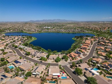 Live the lake community lifestyle in this spacious 4-bed home on on Estrella Mountain Ranch Golf Course in Arizona - for sale on GolfHomes.com, golf home, golf lot