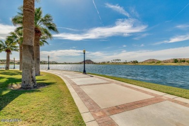 Live the lake community lifestyle in this spacious 4-bed home on on Estrella Mountain Ranch Golf Course in Arizona - for sale on GolfHomes.com, golf home, golf lot