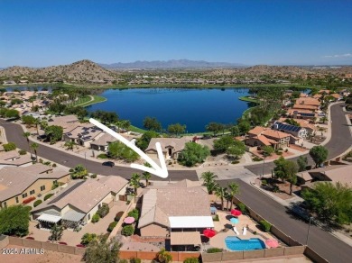 Live the lake community lifestyle in this spacious 4-bed home on on Estrella Mountain Ranch Golf Course in Arizona - for sale on GolfHomes.com, golf home, golf lot