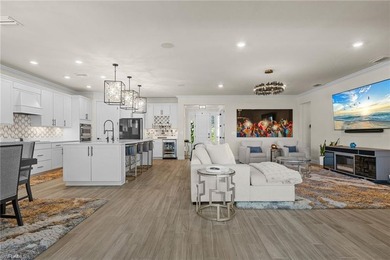 Discover unparalleled luxury in this rare, meticulously on River Hall Country Club in Florida - for sale on GolfHomes.com, golf home, golf lot