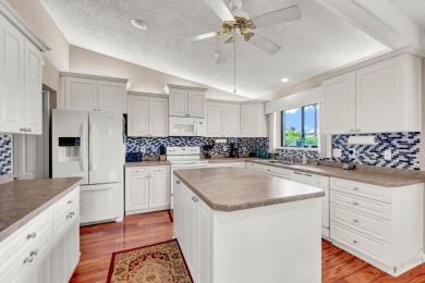 Beautiful views of 2 lakes from all the living areas in this 3 on Martin Downs Country Club in Florida - for sale on GolfHomes.com, golf home, golf lot
