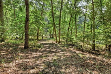 Discover the perfect blend of nature and tranquility on this on Innsbrook Resort Golf Course in Missouri - for sale on GolfHomes.com, golf home, golf lot