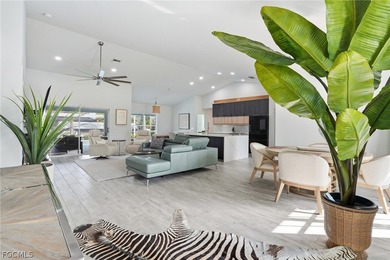 Luxury Waterfront Living in the Heart of Cape Coral's on Royal Tee Country Club in Florida - for sale on GolfHomes.com, golf home, golf lot