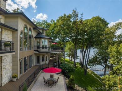 One of 6 Mile Cove's finest waterfront estates situated on 200 on Tan-Tar-A Golf Club in Missouri - for sale on GolfHomes.com, golf home, golf lot