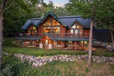 Welcome to this stunning Up North luxury log home perfectly on Boyne Mountain Resort - Monument Course in Michigan - for sale on GolfHomes.com, golf home, golf lot