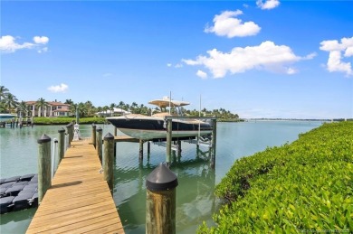 Discover this expansive Waterfront Estate located on a secluded on Sailfish Point Golf Club, Inc. in Florida - for sale on GolfHomes.com, golf home, golf lot