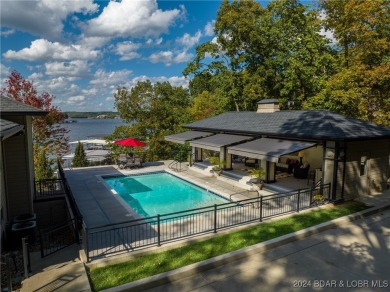 One of 6 Mile Cove's finest waterfront estates situated on 200 on Tan-Tar-A Golf Club in Missouri - for sale on GolfHomes.com, golf home, golf lot