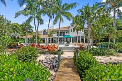 Discover this expansive Waterfront Estate located on a secluded on Sailfish Point Golf Club, Inc. in Florida - for sale on GolfHomes.com, golf home, golf lot