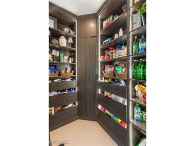 Experience modern luxury and unmatched privacy in this on Reflection Bay Golf Club in Nevada - for sale on GolfHomes.com, golf home, golf lot