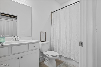 Set along a golf course with open views and no homes behind on Copperhead Golf Club in Florida - for sale on GolfHomes.com, golf home, golf lot