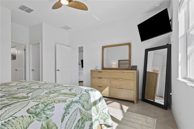 Set along a golf course with open views and no homes behind on Copperhead Golf Club in Florida - for sale on GolfHomes.com, golf home, golf lot