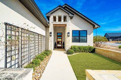 Experience luxury Hill Country living in this stunning rock & on The Club At Comanche Trace in Texas - for sale on GolfHomes.com, golf home, golf lot