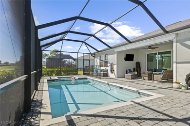 Set along a golf course with open views and no homes behind on Copperhead Golf Club in Florida - for sale on GolfHomes.com, golf home, golf lot