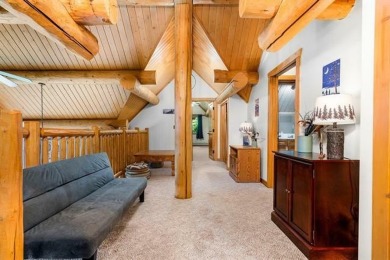 Welcome to this stunning Up North luxury log home perfectly on Boyne Mountain Resort - Monument Course in Michigan - for sale on GolfHomes.com, golf home, golf lot