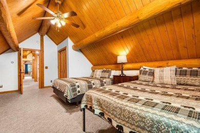 Welcome to this stunning Up North luxury log home perfectly on Boyne Mountain Resort - Monument Course in Michigan - for sale on GolfHomes.com, golf home, golf lot