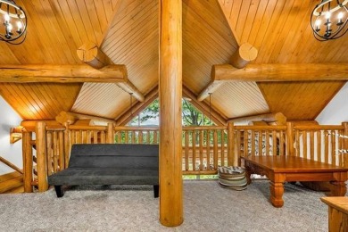 Welcome to this stunning Up North luxury log home perfectly on Boyne Mountain Resort - Monument Course in Michigan - for sale on GolfHomes.com, golf home, golf lot