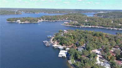 One of 6 Mile Cove's finest waterfront estates situated on 200 on Tan-Tar-A Golf Club in Missouri - for sale on GolfHomes.com, golf home, golf lot