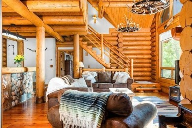 Welcome to this stunning Up North luxury log home perfectly on Boyne Mountain Resort - Monument Course in Michigan - for sale on GolfHomes.com, golf home, golf lot