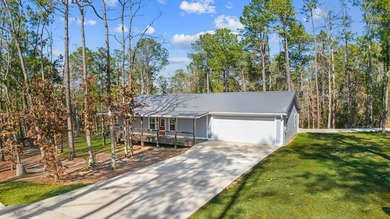 This beautifully appointed 3-bedroom, 2-bath home with a 2-car on Rayburn Country Club in Texas - for sale on GolfHomes.com, golf home, golf lot