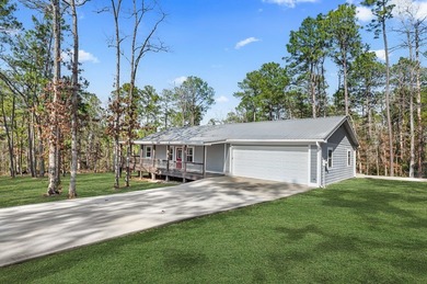 This beautifully appointed 3-bedroom, 2-bath home with a 2-car on Rayburn Country Club in Texas - for sale on GolfHomes.com, golf home, golf lot