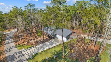 This beautifully appointed 3-bedroom, 2-bath home with a 2-car on Rayburn Country Club in Texas - for sale on GolfHomes.com, golf home, golf lot