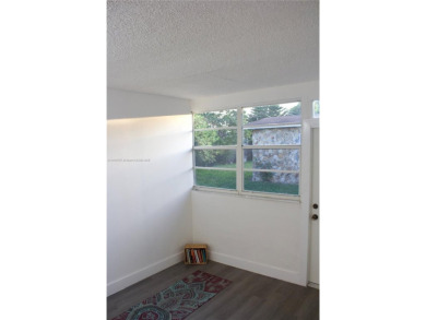 HOT PROPERTY ALERT: Beautifully updated single-family home on Sunrise Lakes Phase III in Florida - for sale on GolfHomes.com, golf home, golf lot