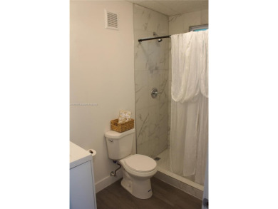 HOT PROPERTY ALERT: Beautifully updated single-family home on Sunrise Lakes Phase III in Florida - for sale on GolfHomes.com, golf home, golf lot