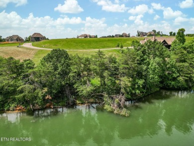 Enjoy breathtaking views into your deep water cove in the on Wind River Golf Course in Tennessee - for sale on GolfHomes.com, golf home, golf lot