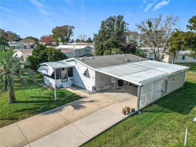 Enjoy The Villages lifestyle in this well-maintained 2-bedroom on Orange Blossom Hills Golf and Country Club in Florida - for sale on GolfHomes.com, golf home, golf lot