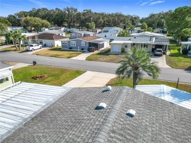 Enjoy The Villages lifestyle in this well-maintained 2-bedroom on Orange Blossom Hills Golf and Country Club in Florida - for sale on GolfHomes.com, golf home, golf lot