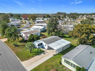 Enjoy The Villages lifestyle in this well-maintained 2-bedroom on Orange Blossom Hills Golf and Country Club in Florida - for sale on GolfHomes.com, golf home, golf lot