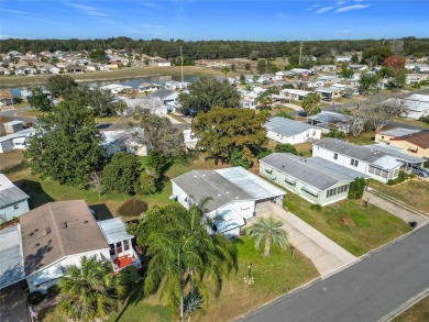 Enjoy The Villages lifestyle in this well-maintained 2-bedroom on Orange Blossom Hills Golf and Country Club in Florida - for sale on GolfHomes.com, golf home, golf lot