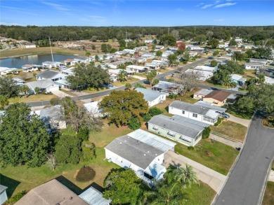 Enjoy The Villages lifestyle in this well-maintained 2-bedroom on Orange Blossom Hills Golf and Country Club in Florida - for sale on GolfHomes.com, golf home, golf lot