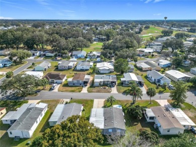 Enjoy The Villages lifestyle in this well-maintained 2-bedroom on Orange Blossom Hills Golf and Country Club in Florida - for sale on GolfHomes.com, golf home, golf lot