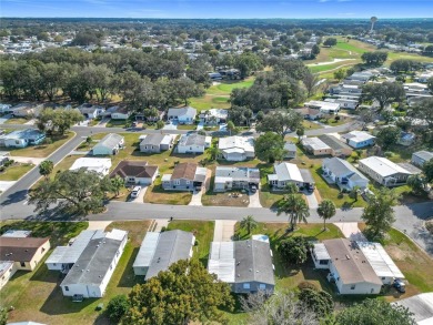 Enjoy The Villages lifestyle in this well-maintained 2-bedroom on Orange Blossom Hills Golf and Country Club in Florida - for sale on GolfHomes.com, golf home, golf lot