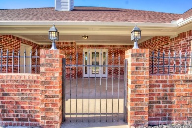 This exceptionally-updated 3 bedroom, 3 bathroom brick home in on Cedar Creek Country Club in Texas - for sale on GolfHomes.com, golf home, golf lot